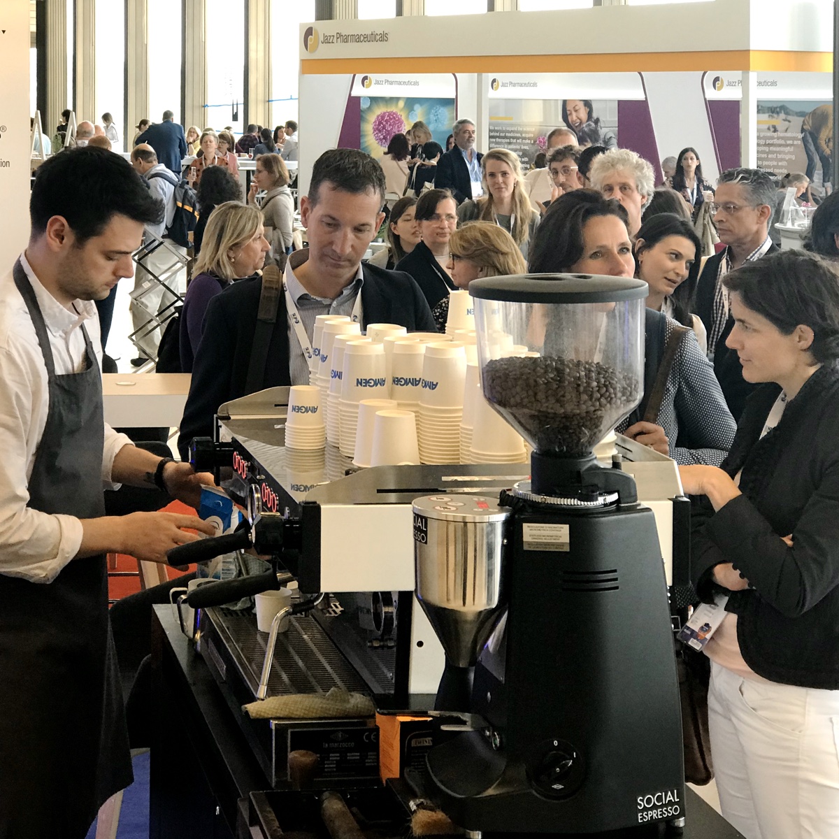 Barista serving event coffee at barista exhibition bar